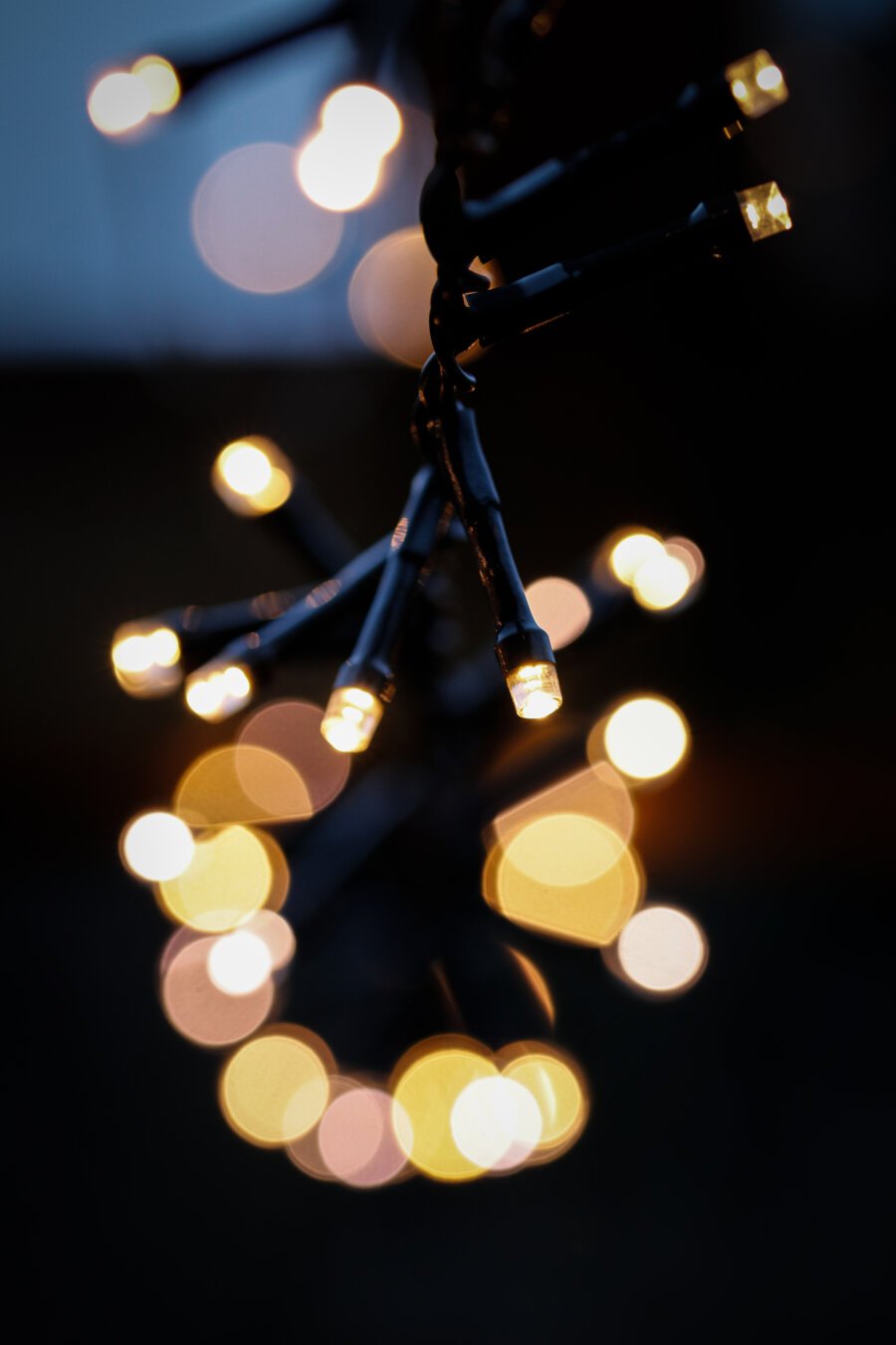 A photograph of a light string with LEDs in the fore- and background