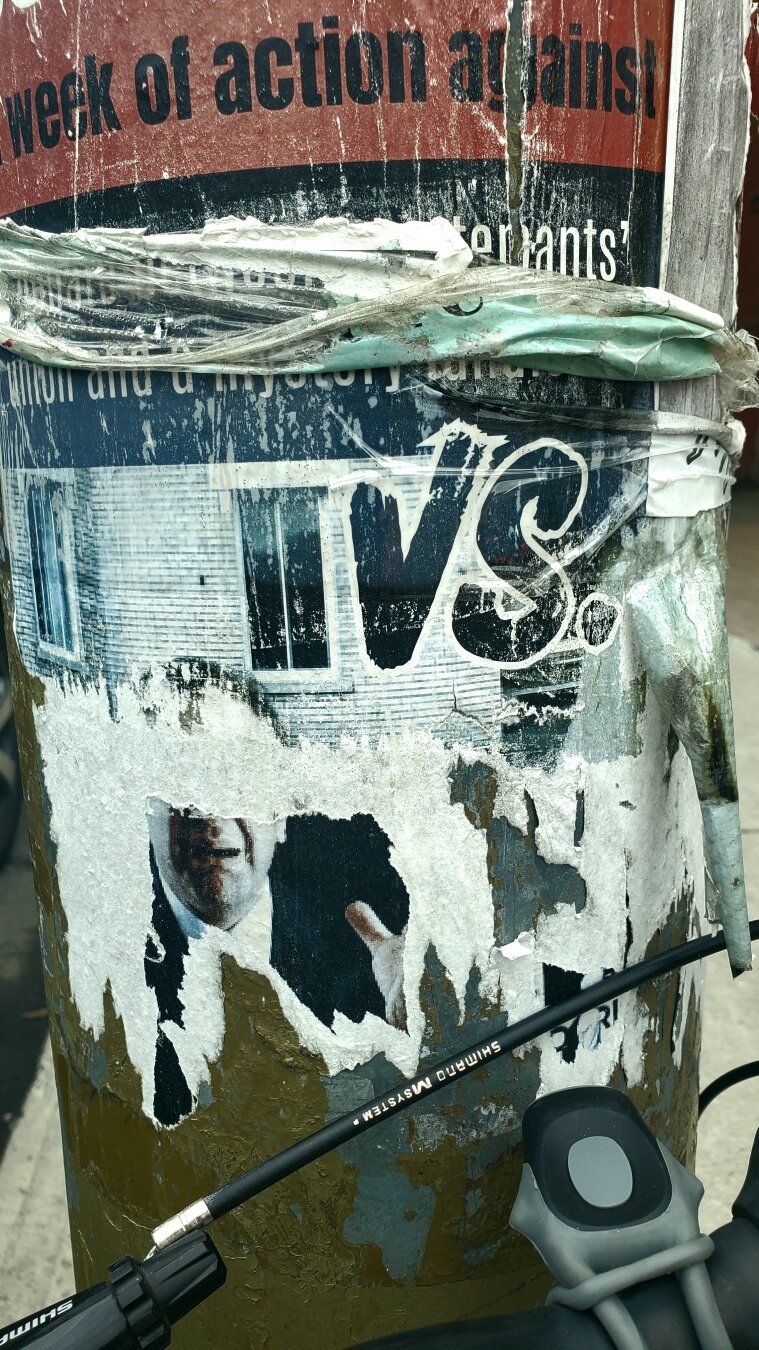 Scraps of handbills and posters layered on posts in the Mile End neighbourhood of Montreal, Quebec creating interesting textures and composition as an emergent property of their slow destruction