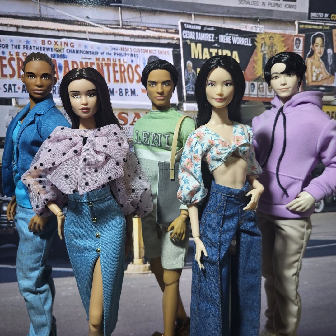 Two female dolls and 3 male dolls, all in casual wear.