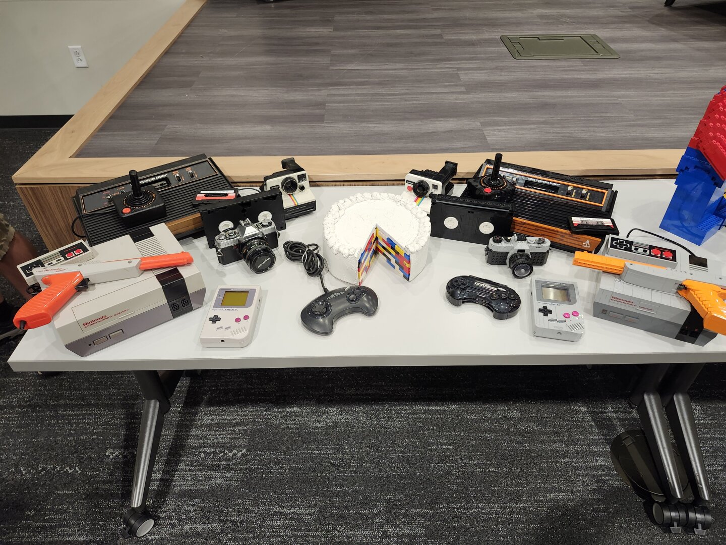 several models made of Lego bricks sitting next to the objects they are models of