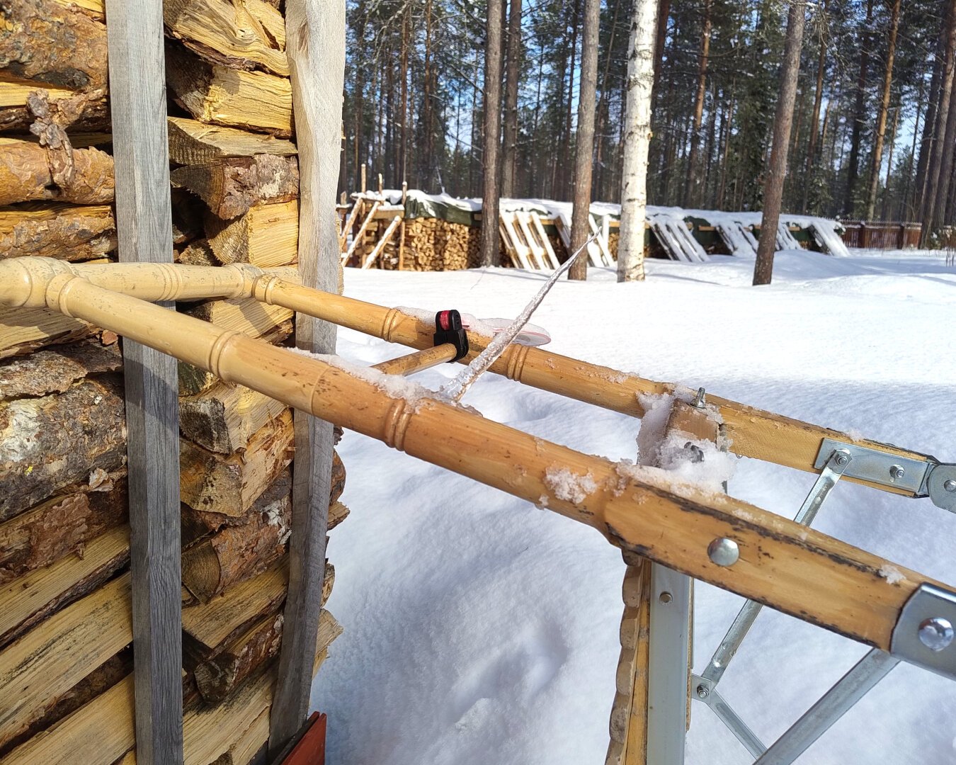 An icicle attached to a kicksled and pointing towards the sky in an unusual 45° angle. I don’t think it grew into that direction originally but was likely a stalagmite at first, before its base started melting and sliding sideways.