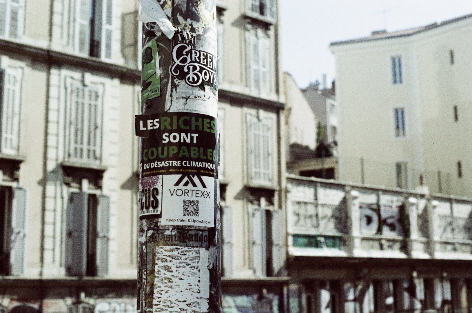 Film photography of a political message, shot in a street of Marseille, France.