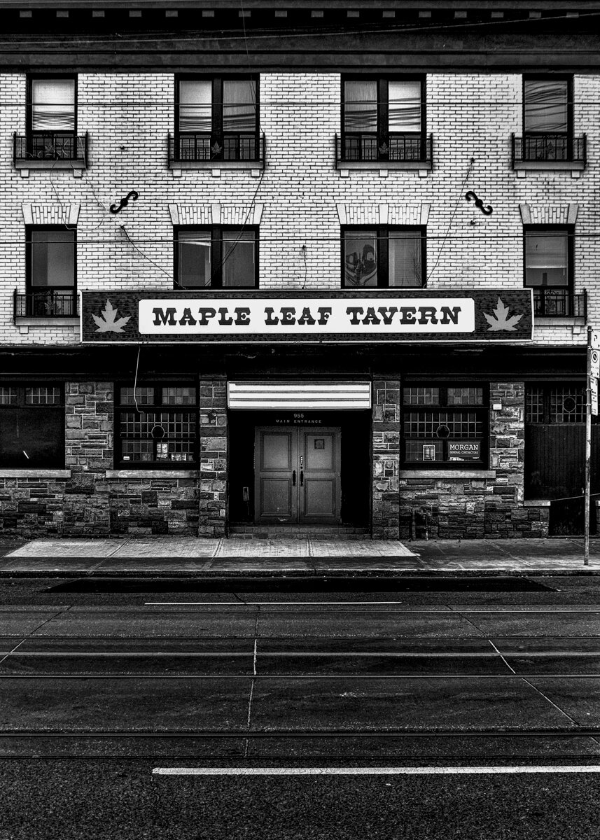Maple Leaf Tavern No 1.

In a building that was constructed in 1910, The Maple Leaf Tavern at No 955 Gerrard St E was THE local dive bar until renovations began in 2013. 

Original photography using a Canon EOS 60D body with a Sigma 17-70mm f2.8 DC Macro OS lens and Silver EFEX Pro as a Lightroom plugin for the Black and White conversion.