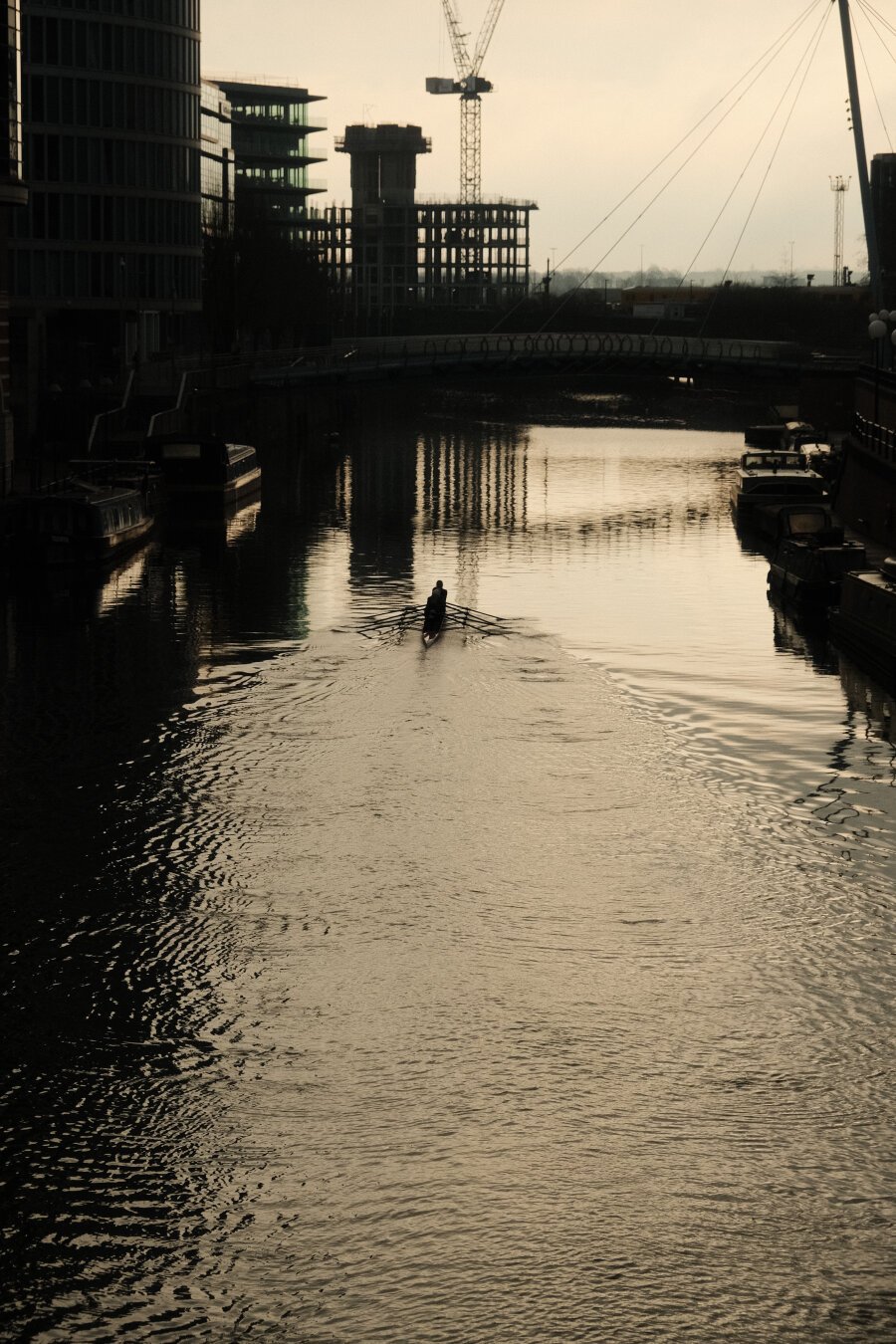 Sport Kayking on the river in the city.