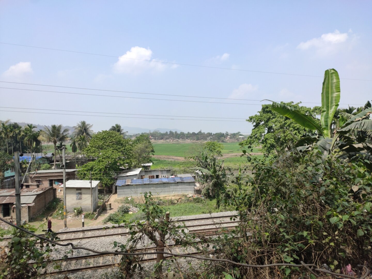 A view of open fields and some old Indian houses ( Yes I'm Indian )