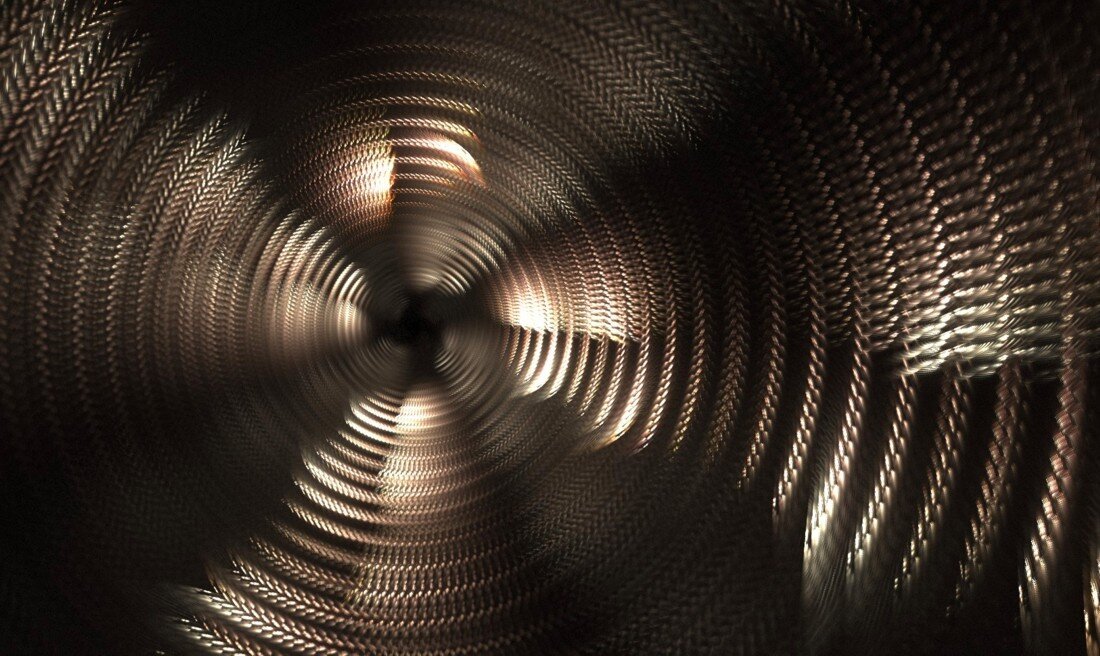 A slightly blurry fractal structure resembling spinning blades.