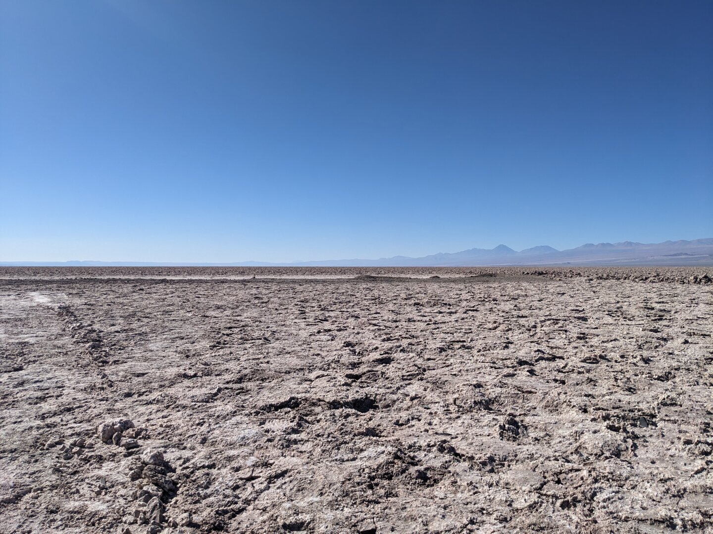 Rugged salt as far as the eye can see under a deep blue sky
