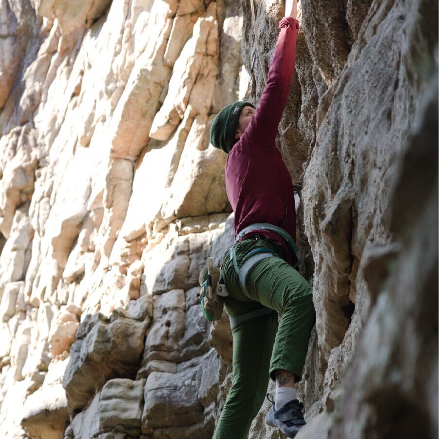 A person climbing a rock face