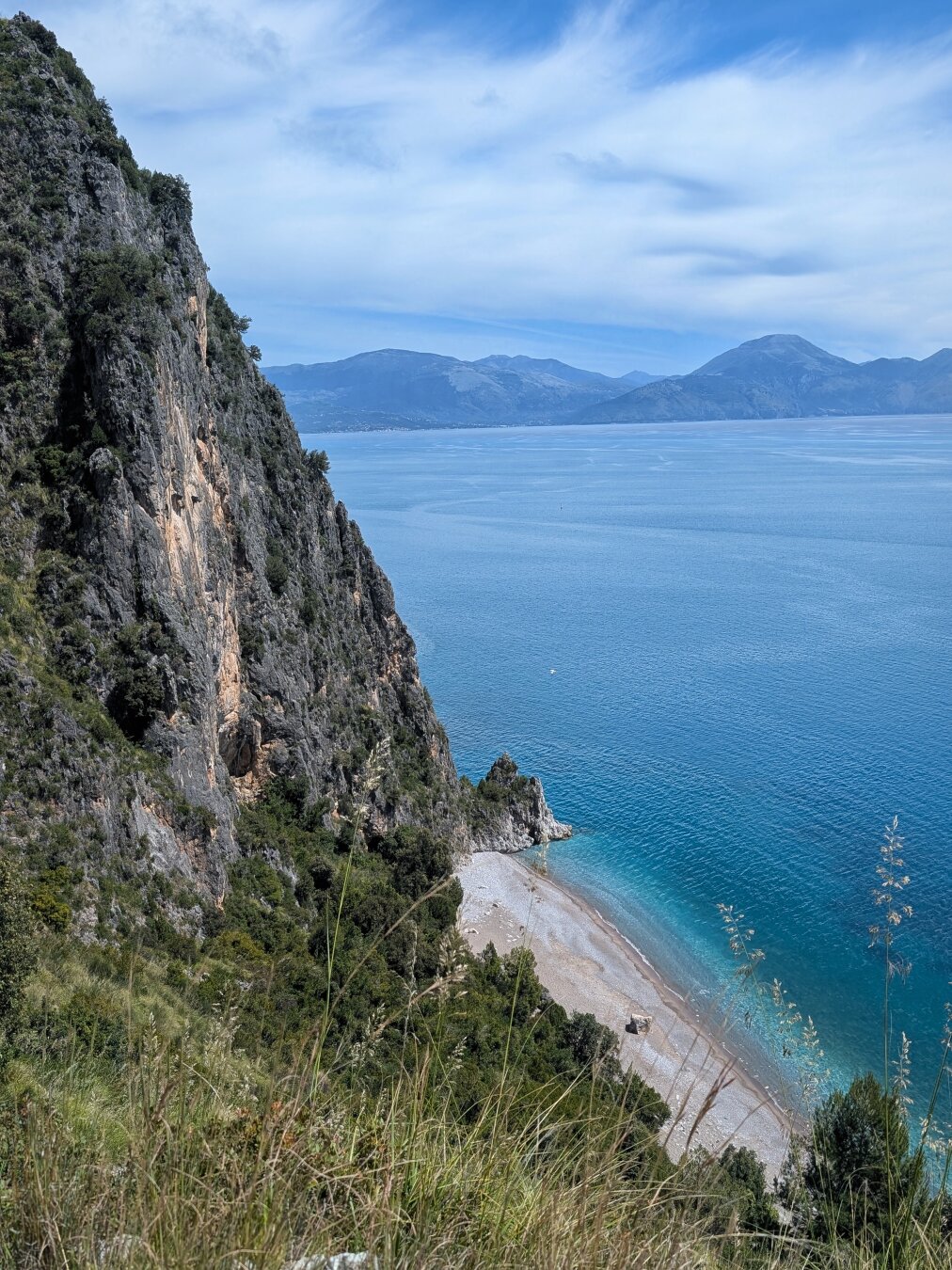 View of the sandy beach (Sciabica beach), enclosed by the coast of Masseta.