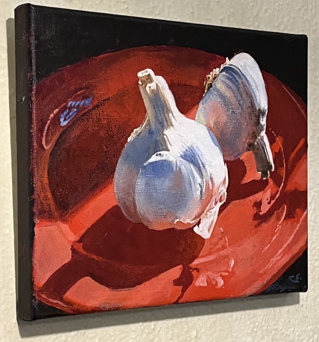 oil paint on a wall, represent garlic white, gray on a purple,orange background.