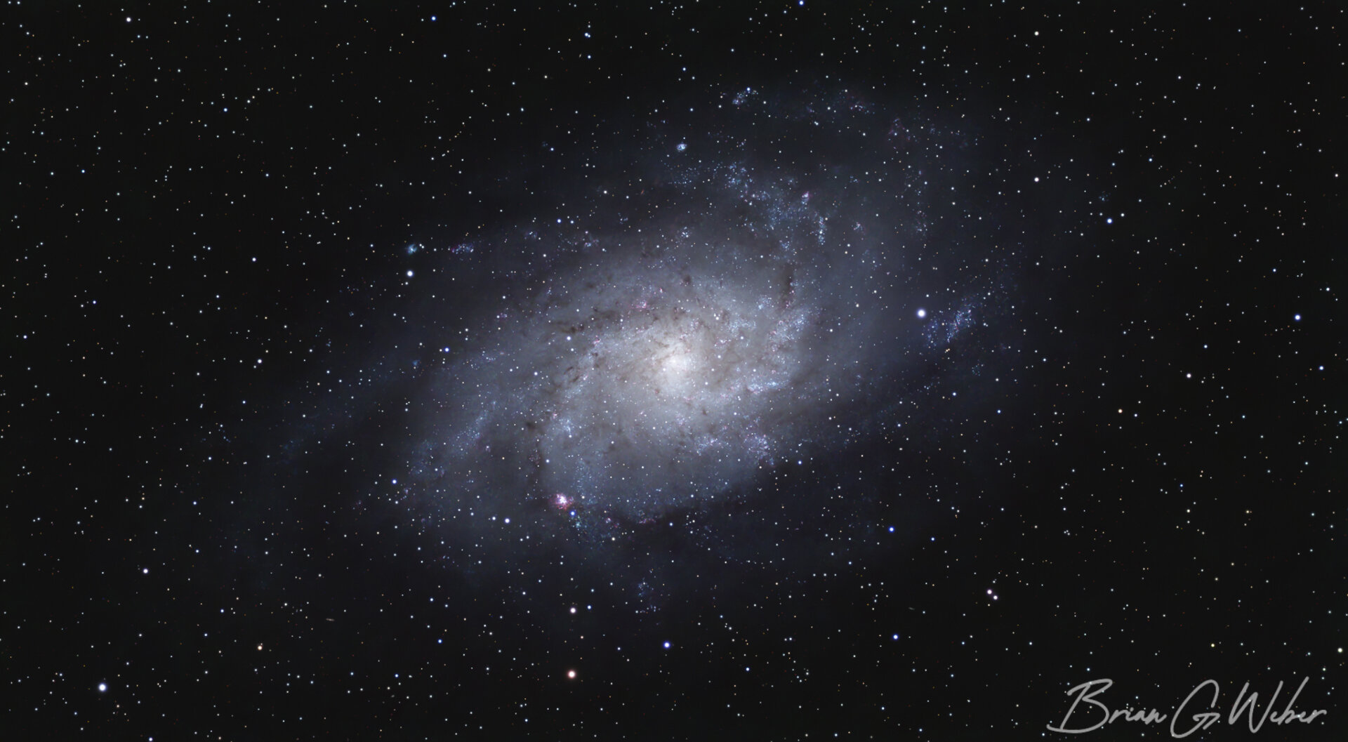Triangulum galaxy captured through my monochrome camera. I captured about 3 hours each on the red, green, and blue filters and 4 hours on the luminance filter.