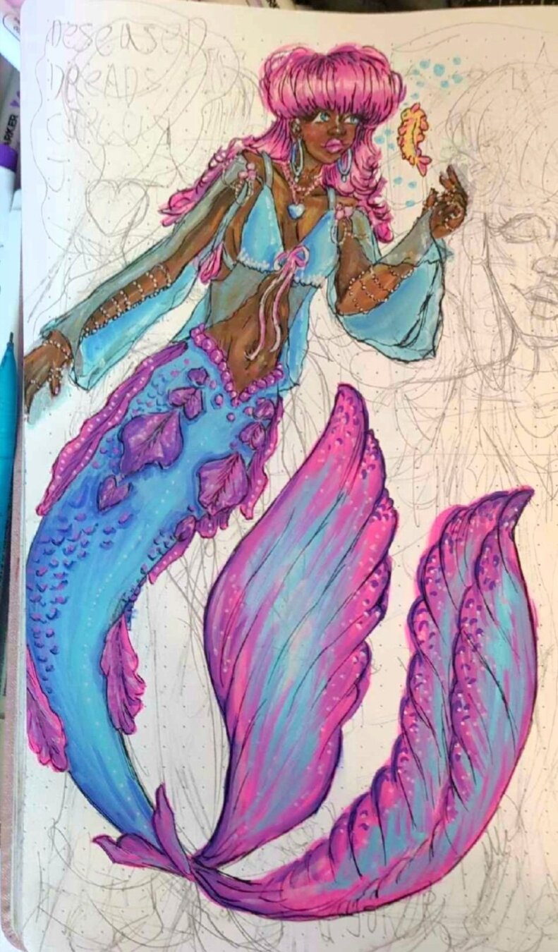 I added a tail to my new mermaid character Delphine! Her tail is blue with a bunch of pink and purple frills and scales. Shes got a light blue top with see-through frilly sleeves, pink hair, pink pearl jewelery, brown skin, and blue eyes