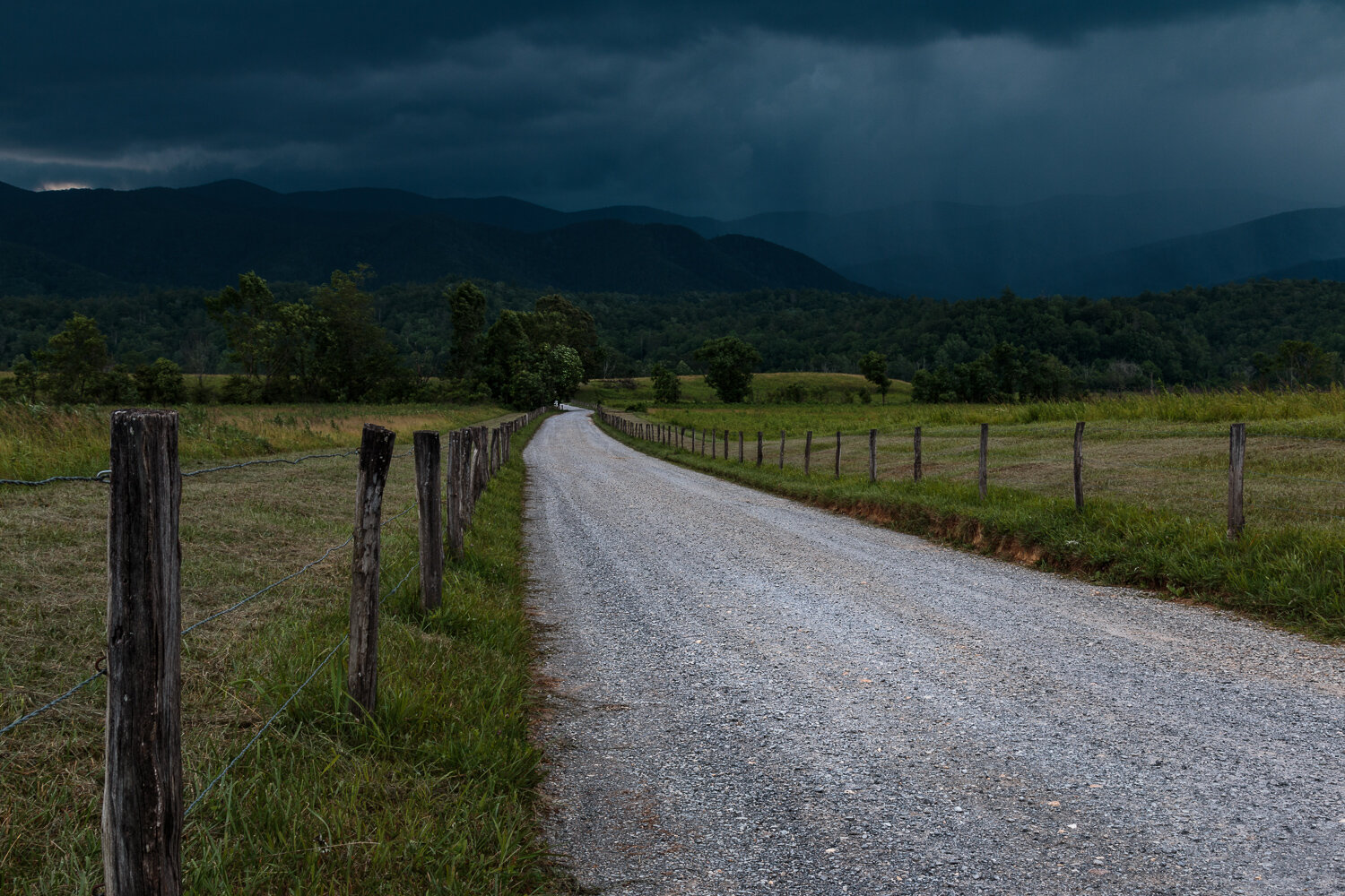 A storm rolls through Cades Cove in the Great Smoky Mountains.