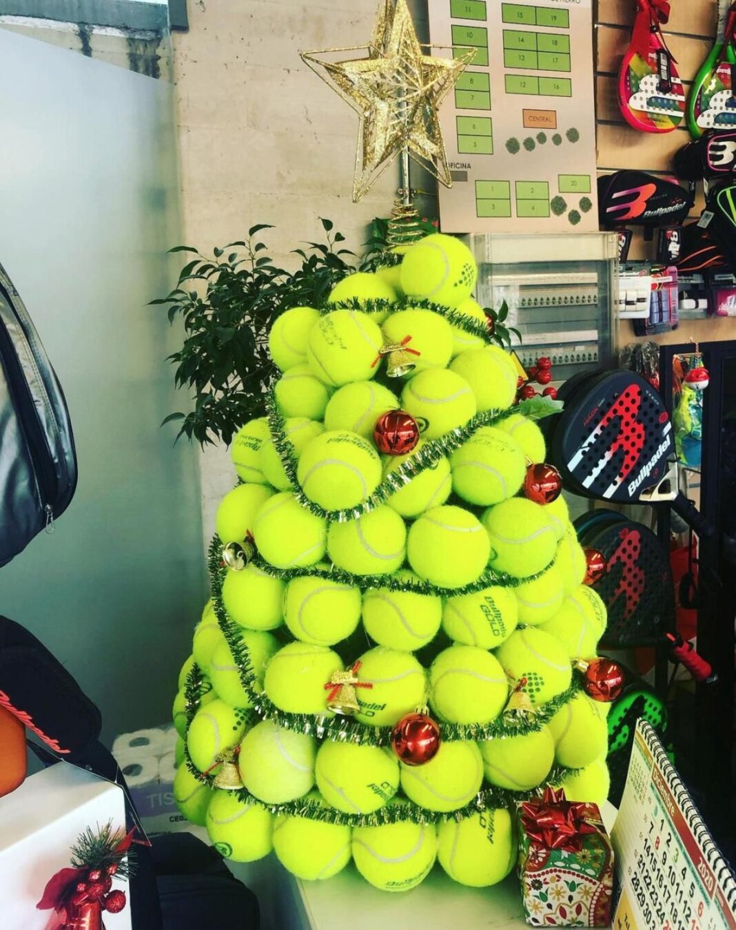 A Christmas tree made with padel balls.