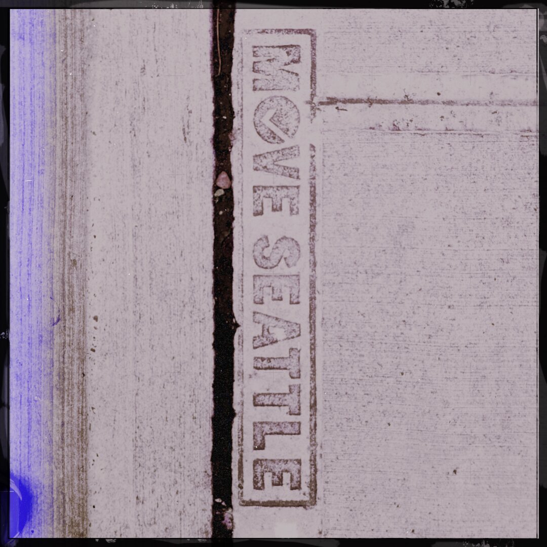 “Move Seattle” sidewalk impression outside Seattle Public Library