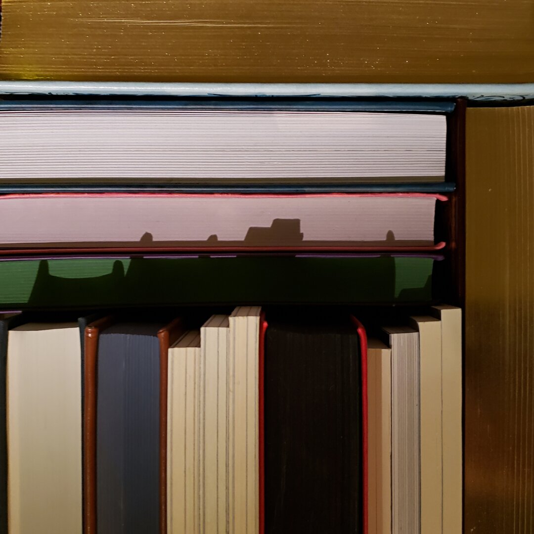 Books casting a shadow