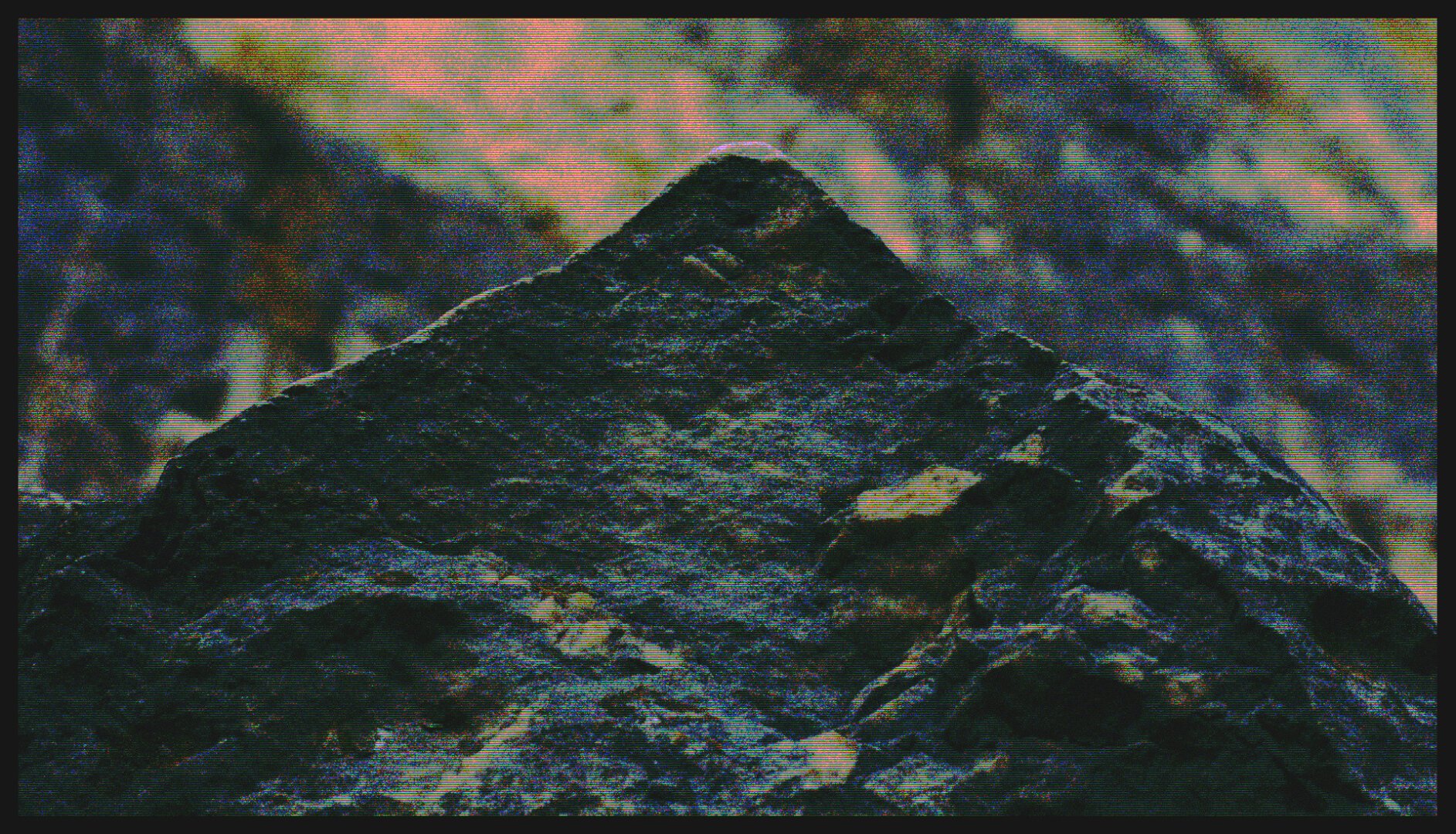 Close-up photo of a triangular rock. Edited with TV-stripes and unrealistic colors