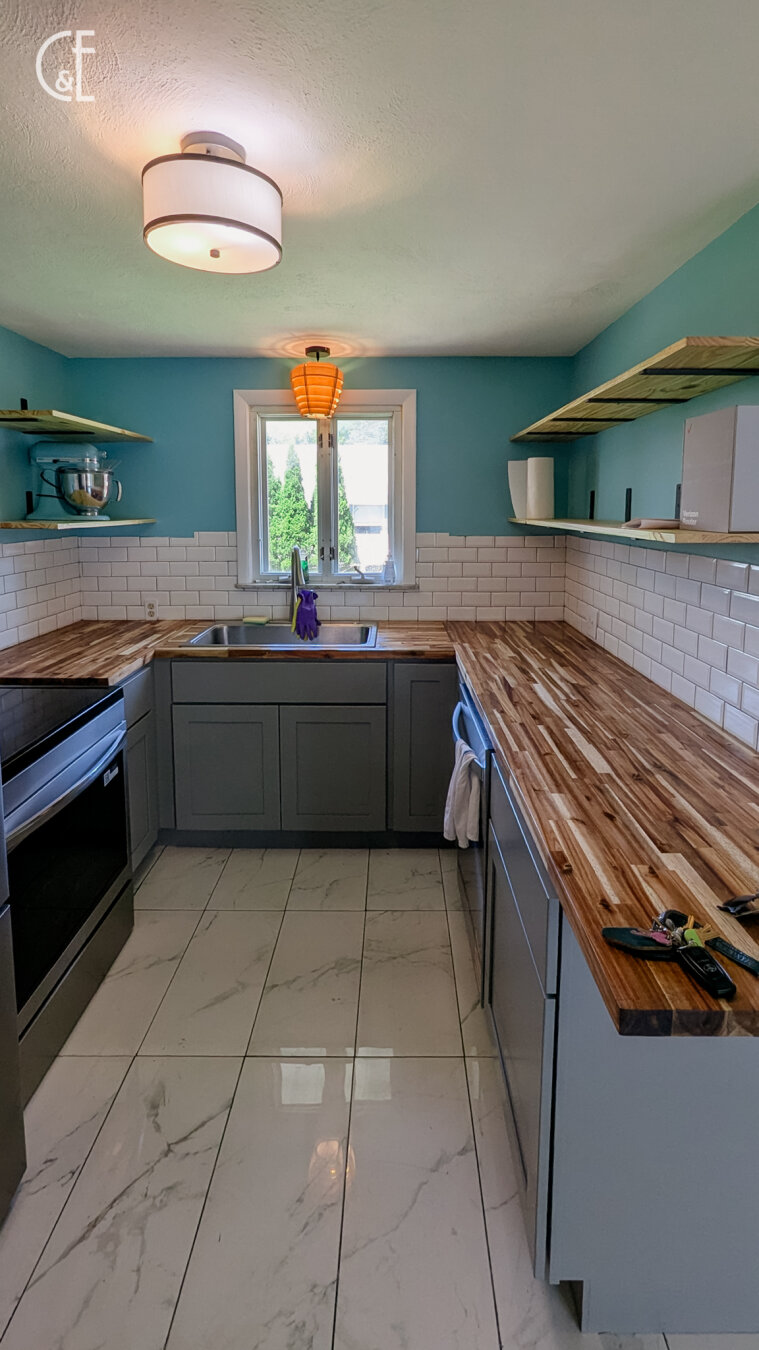 If you know me, it's no secret I love teal, and most blues. We picked colors for our new house based on a wallpaper we picked for our pop walls.We keep moving things in that match crazy well. Our yard chairs and our welcome mats match. Nothing matches as well as what I'm calling my camo mixer.