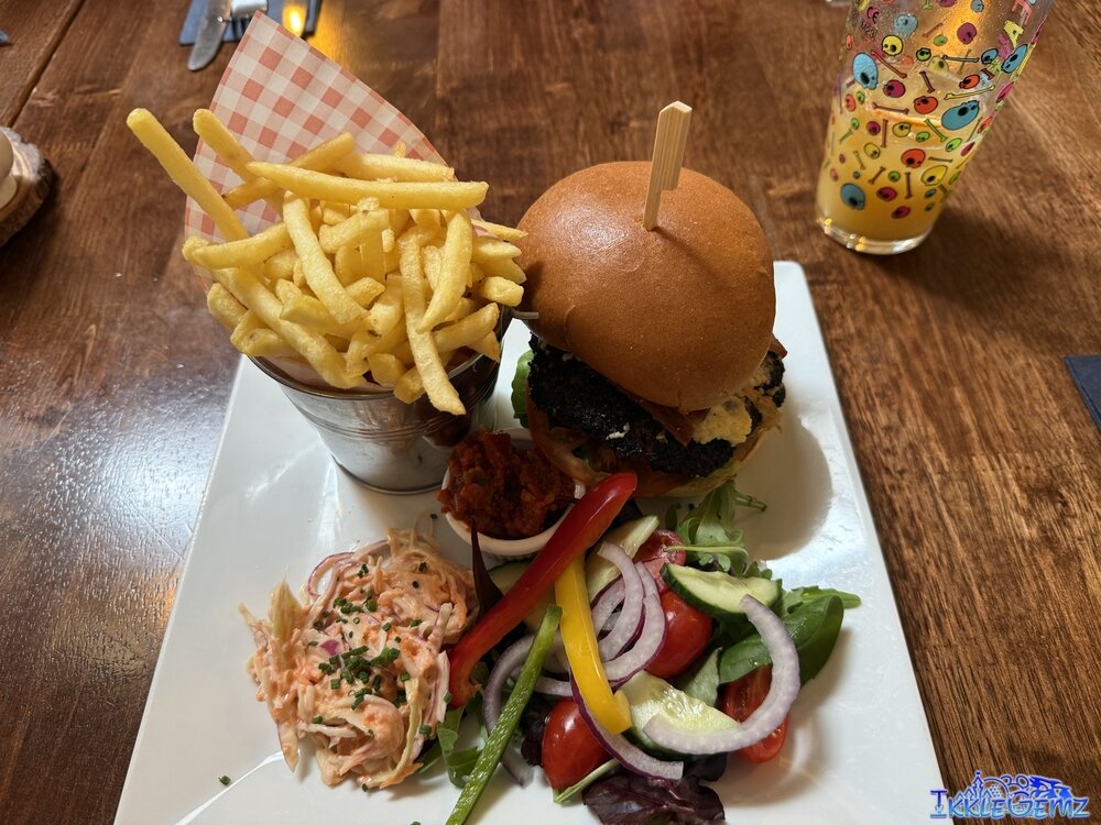 The Bear Burger with fries. coleslaw and salad.