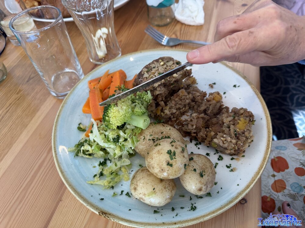 Nut Roast with new potatoes, carrots, broccoli and cabbage