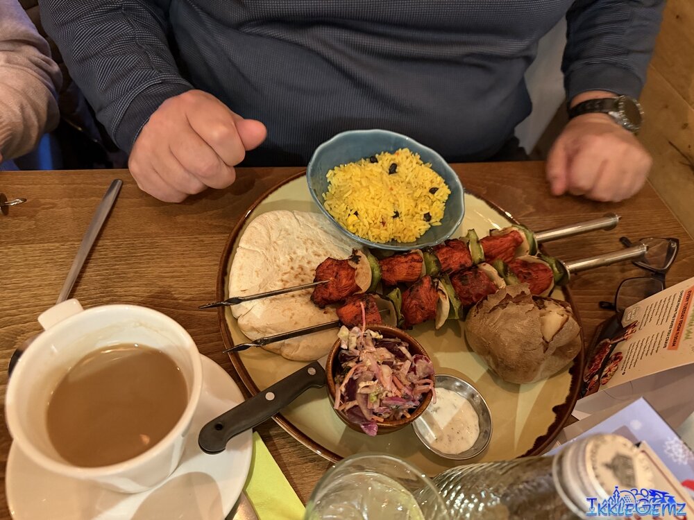 Tandoori Chicken Skewers with pitta bread, dip, coleslaw, jacket potato and rice