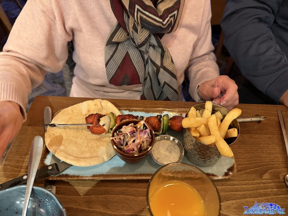 Tandoori Chicken Skewers with pitta bread, dip, coleslaw and chips