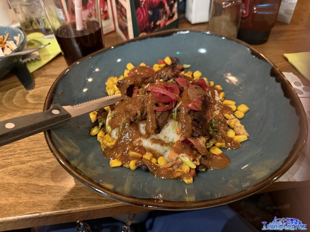 Beef Steak sticky rice bowl with vegetables and satay sauce