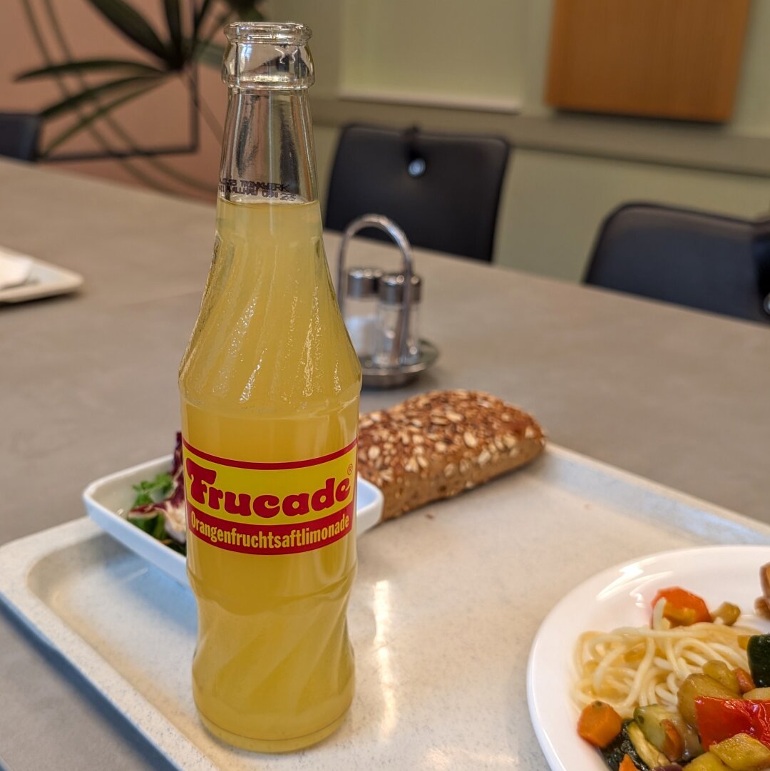 Bottle of Frucade on a dining tablet.