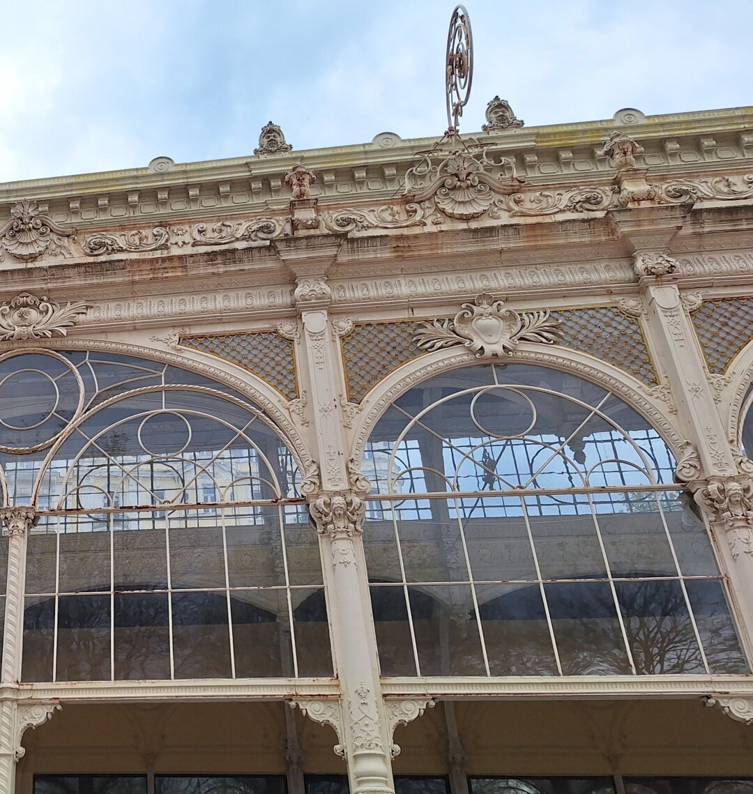 Windowed facade with panels looking like a pair of eyes