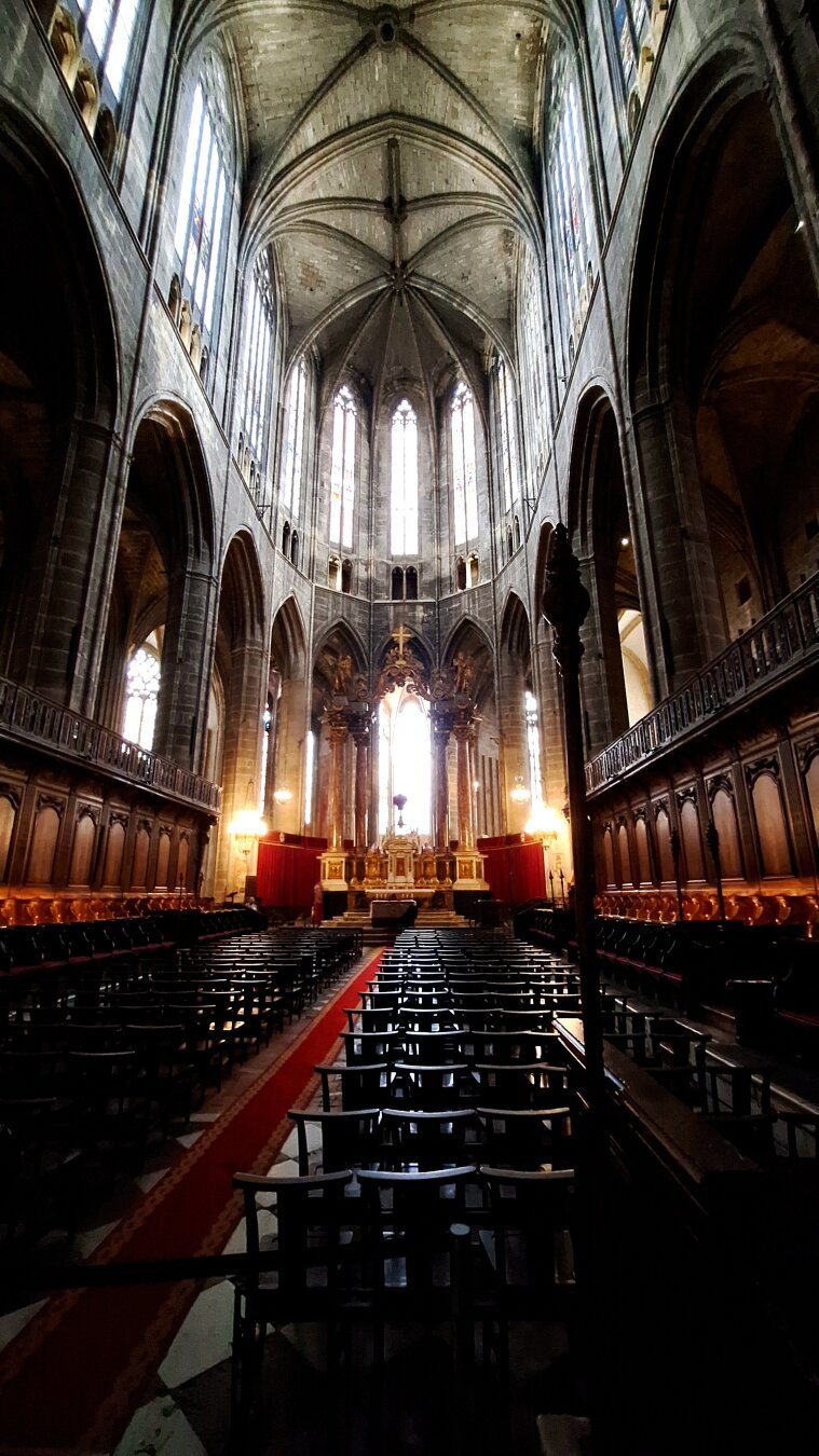 Inside of church, all posh, gilded and symmetrical
