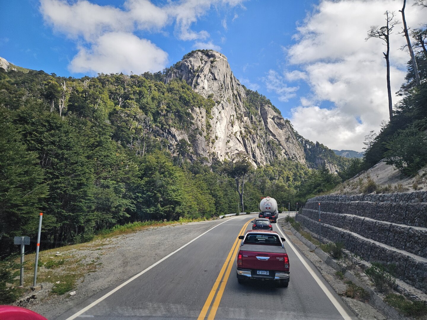 Photograph of a highway surrounded by mountains in the Chilean Argentinian frontier.