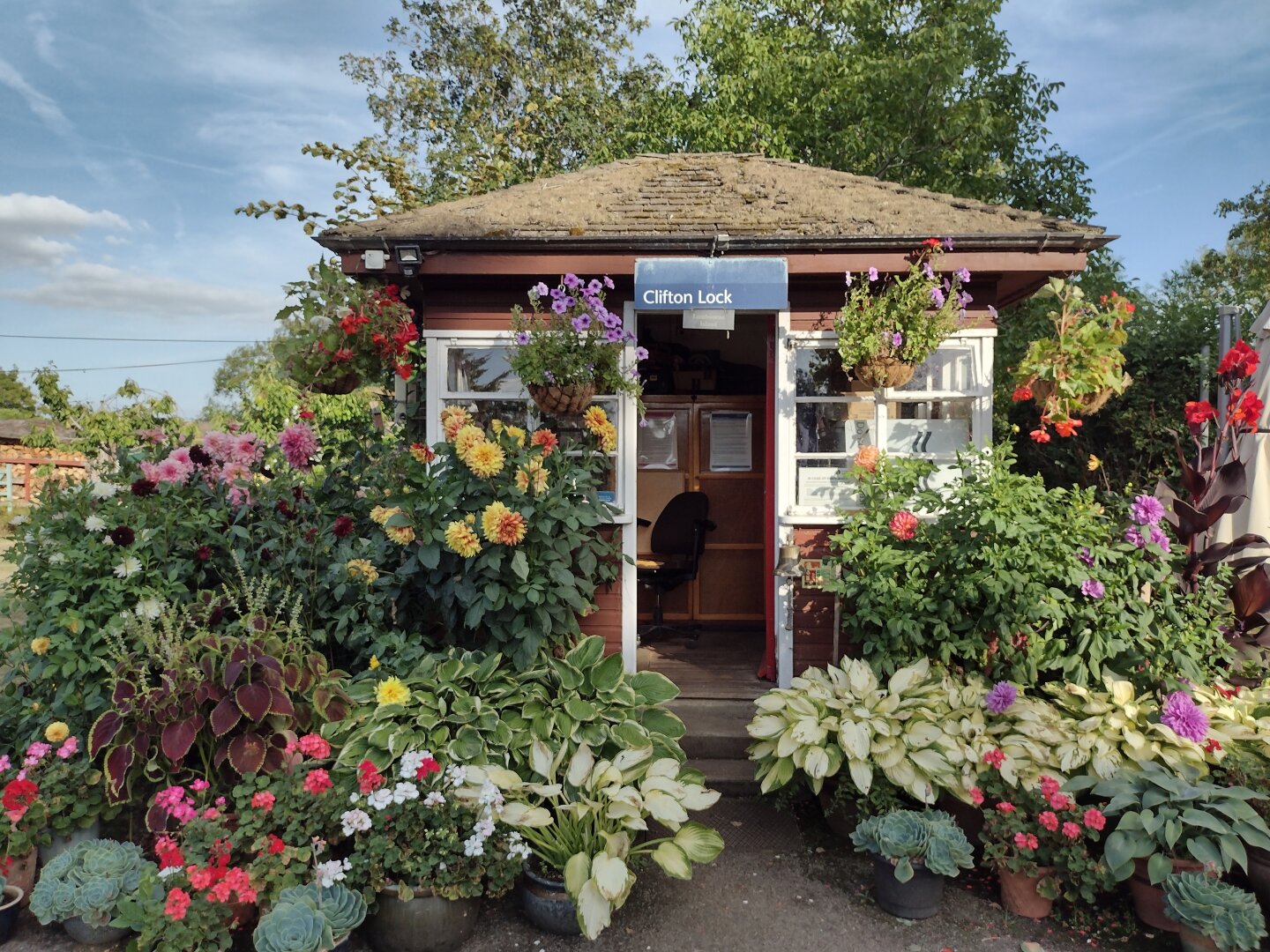 The lock keeper's house, covered in plants