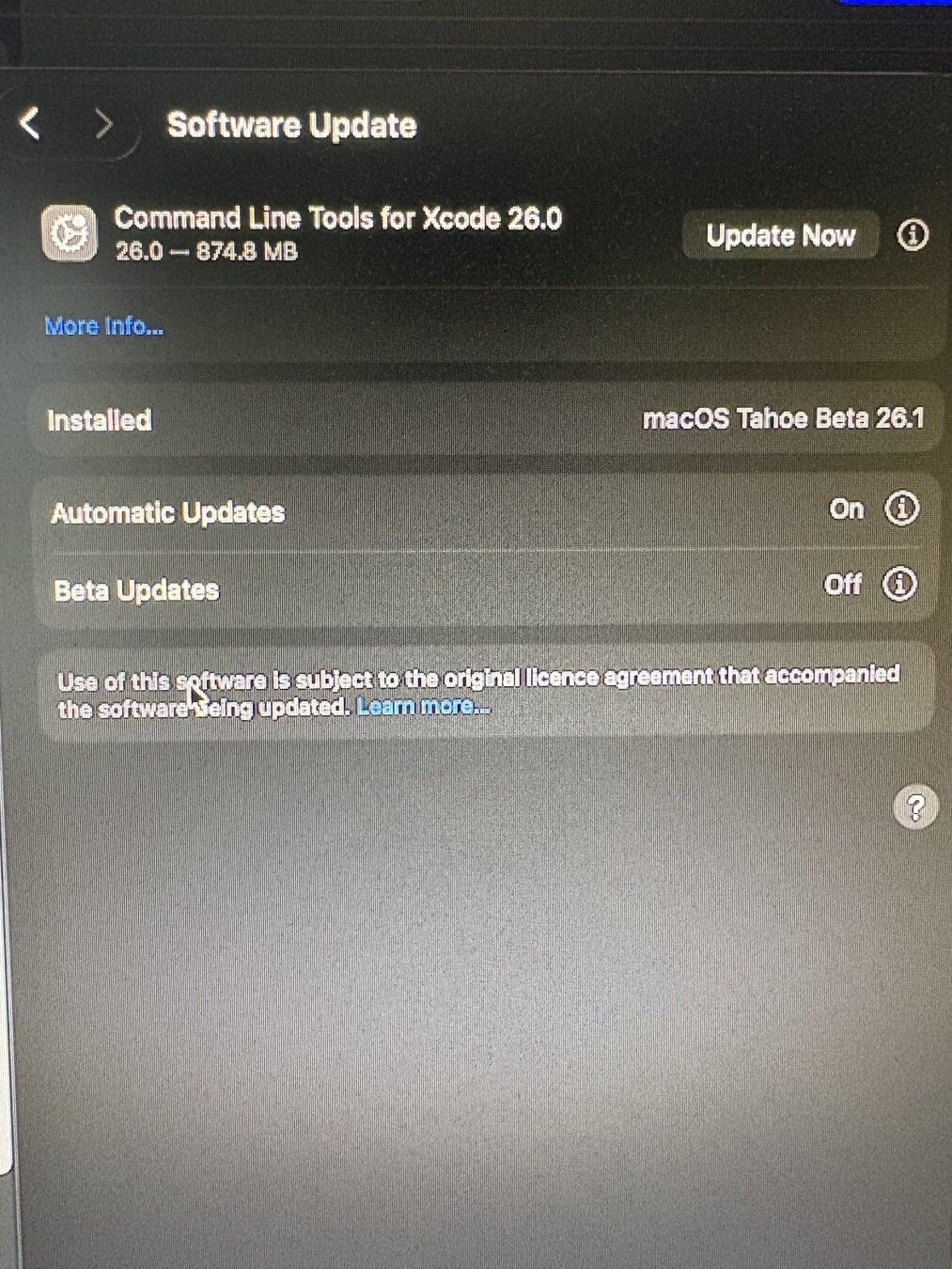A software update screen for the Command Line Tools for Xcode 26.0 is displayed, showing an "Update Now" button and indicating the installed macOS version as Tahoe Beta 26.1.