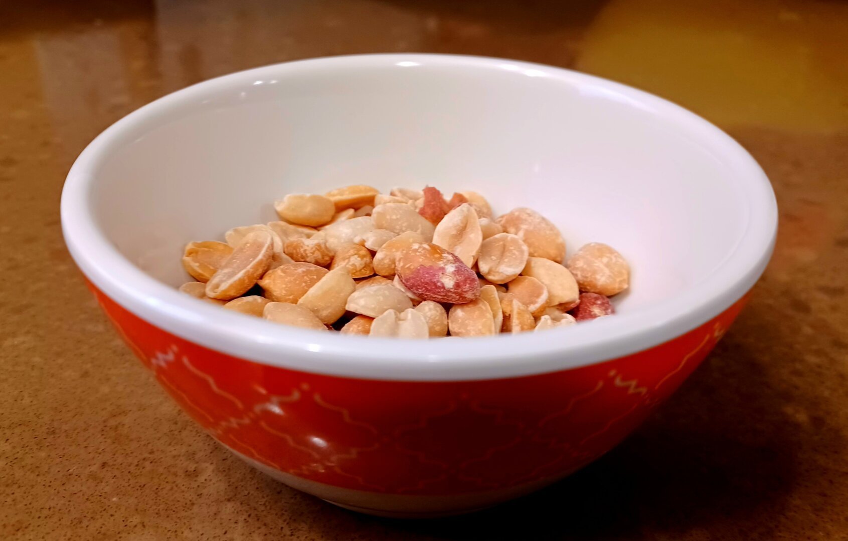 Close up shot of lightly salted dry roasted peanuts.