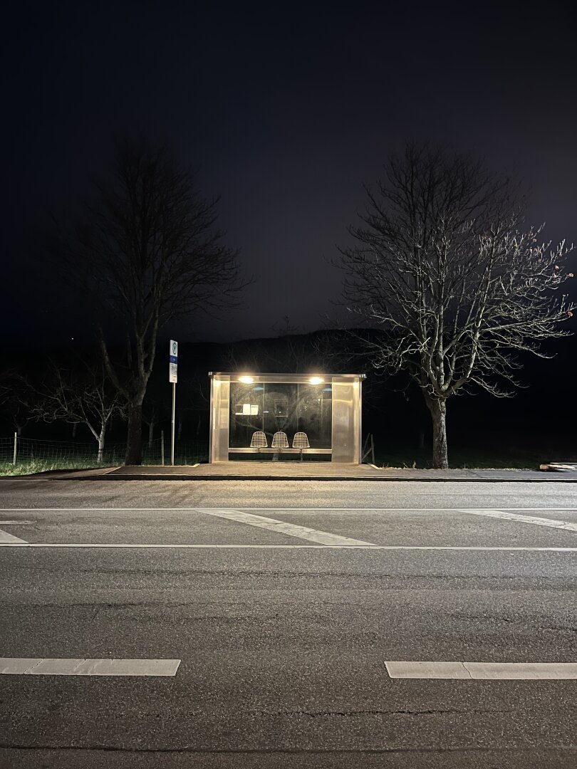 Bus stop in the dark