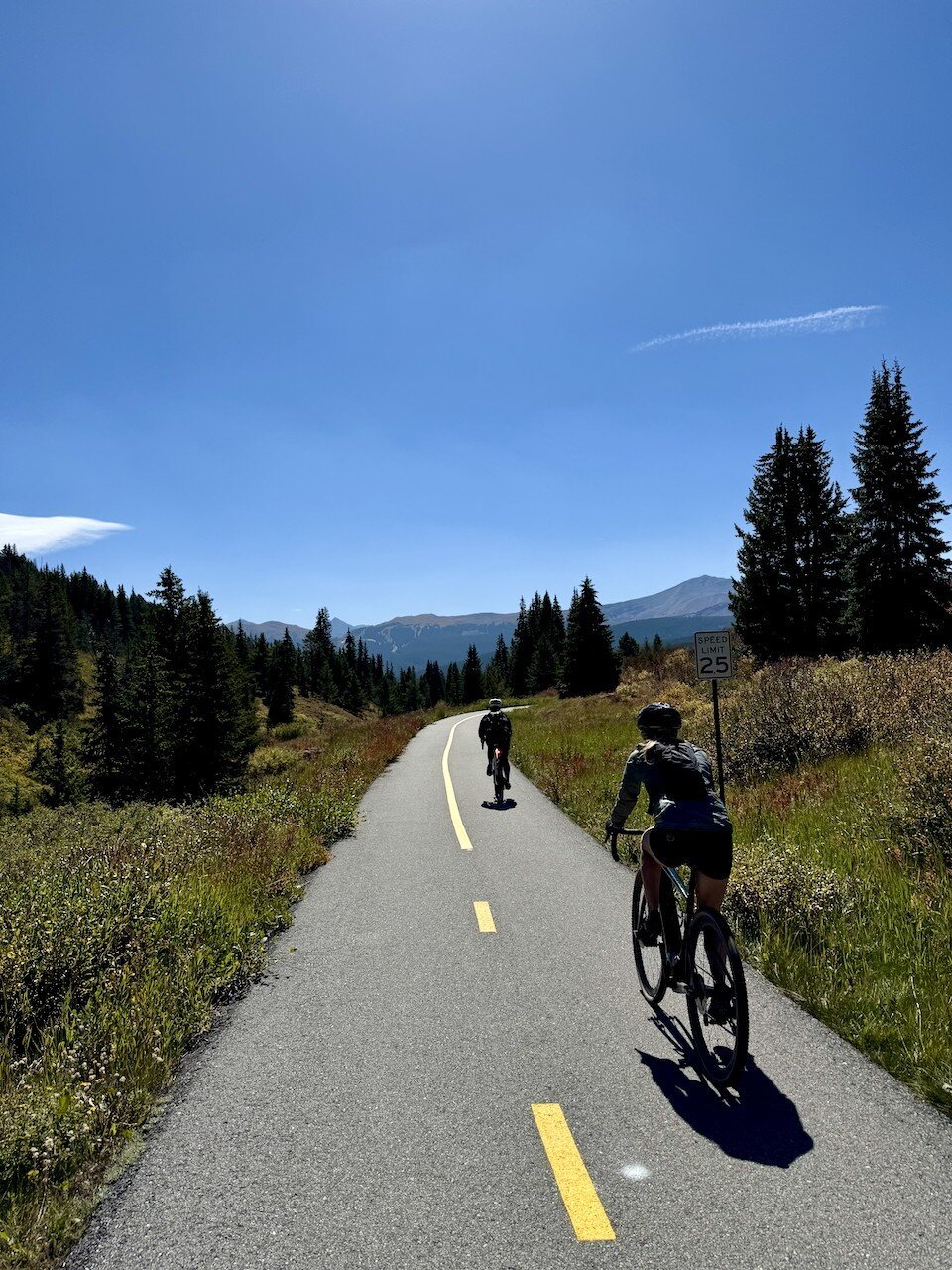 Beautiful paved bike path in the Rocky Mountains - Vail Pass during the summer months.