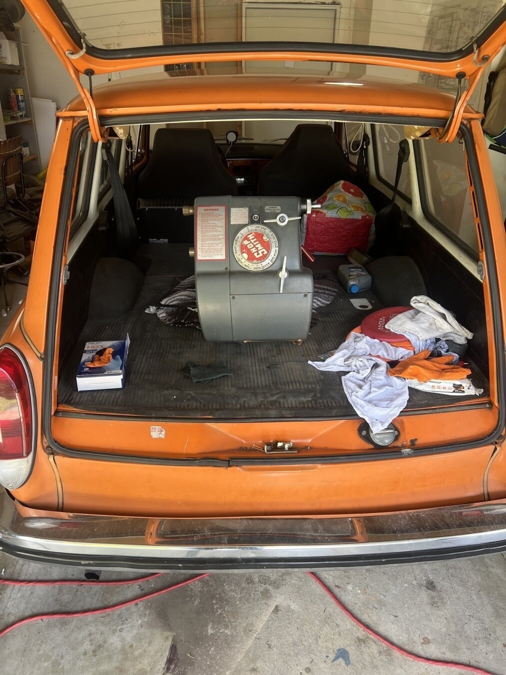 Shopsmith Mark V 500 head stock in open trunk of a 1972 orange VW type 3 squareback.