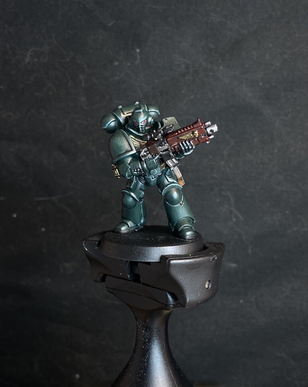 Hand painted miniature of a dark angel from warhammer 40k