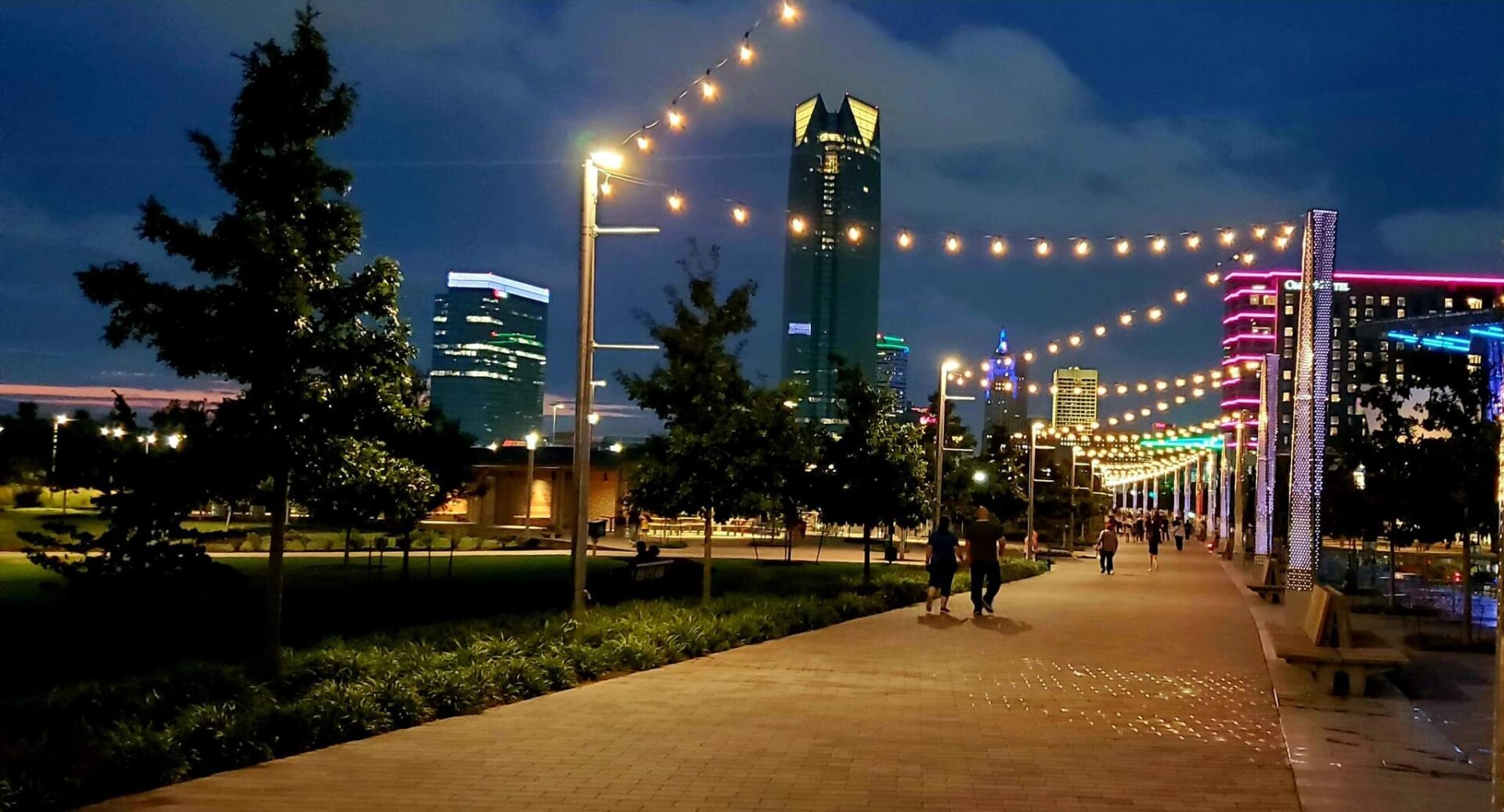 Walkway lit up at night at Scissortail Park in downtown Oklahoma City.