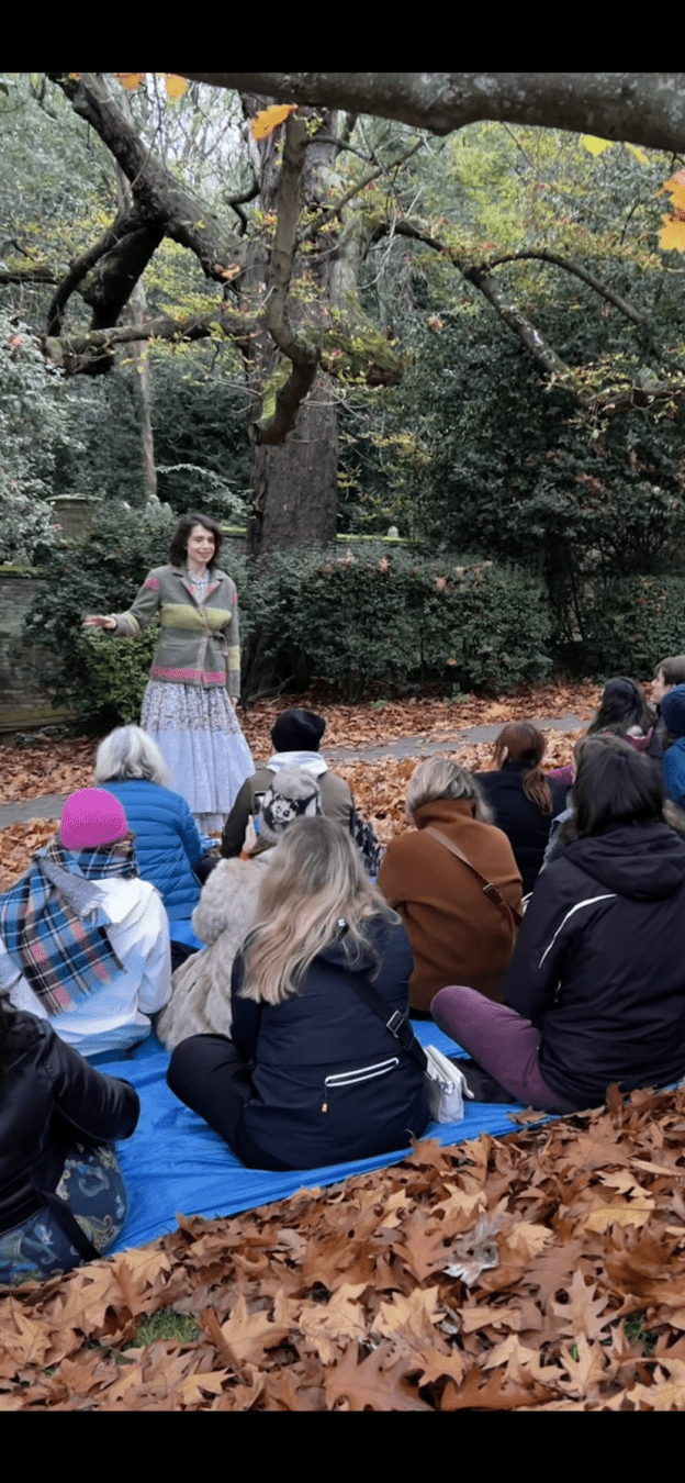 Me in the wild last autumn telling a story to a seated adult audience outside