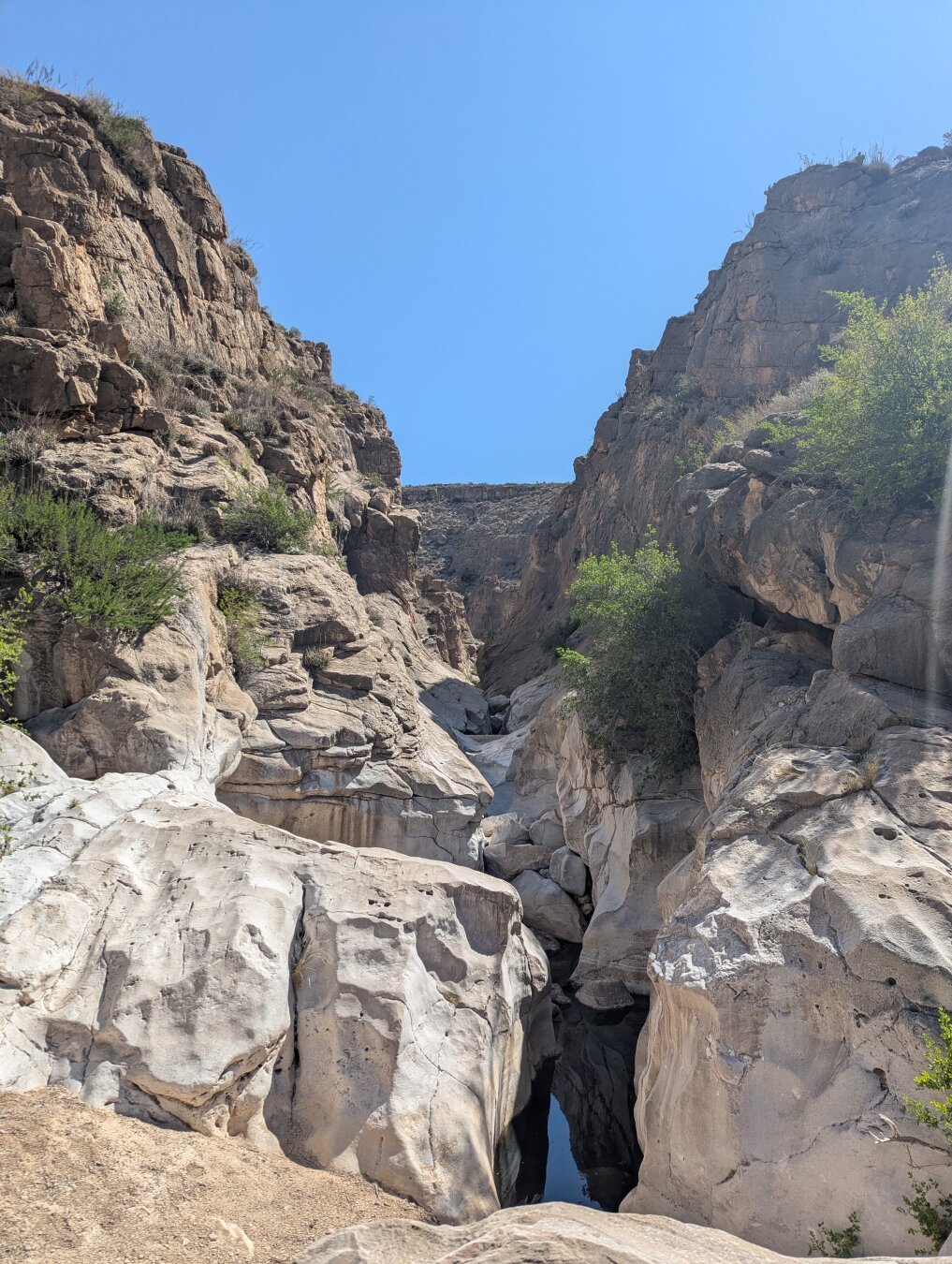 A view from inside Ernst tinaja canyon of water smoothed rock