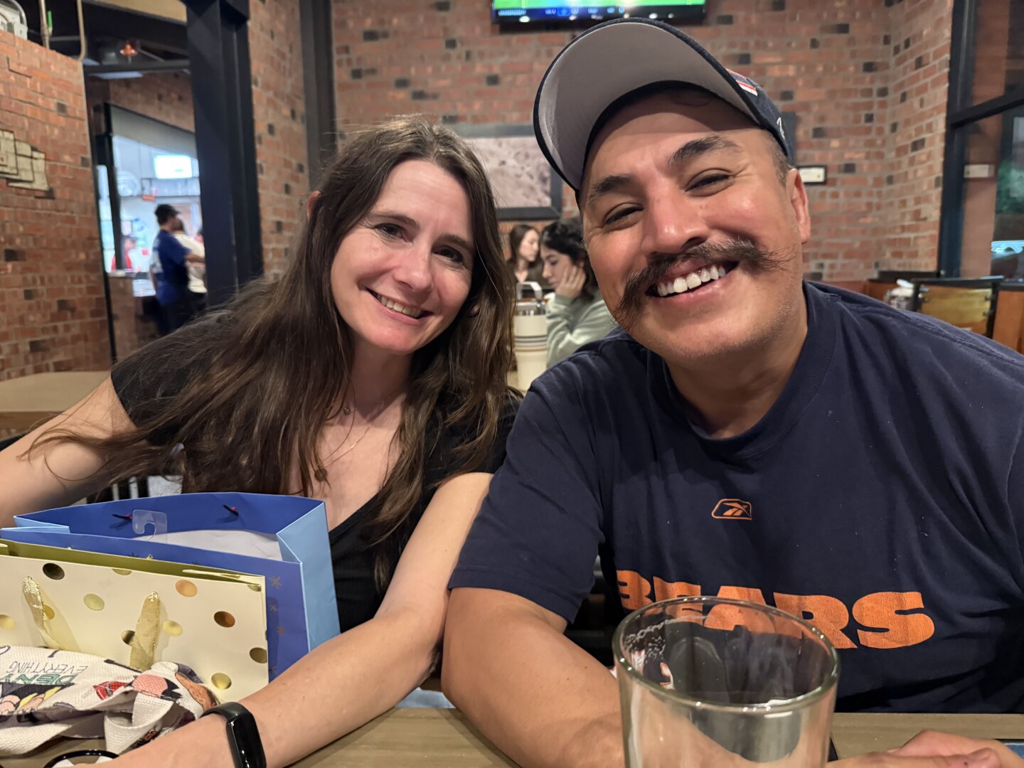 A woman and her friend at a restaurant
