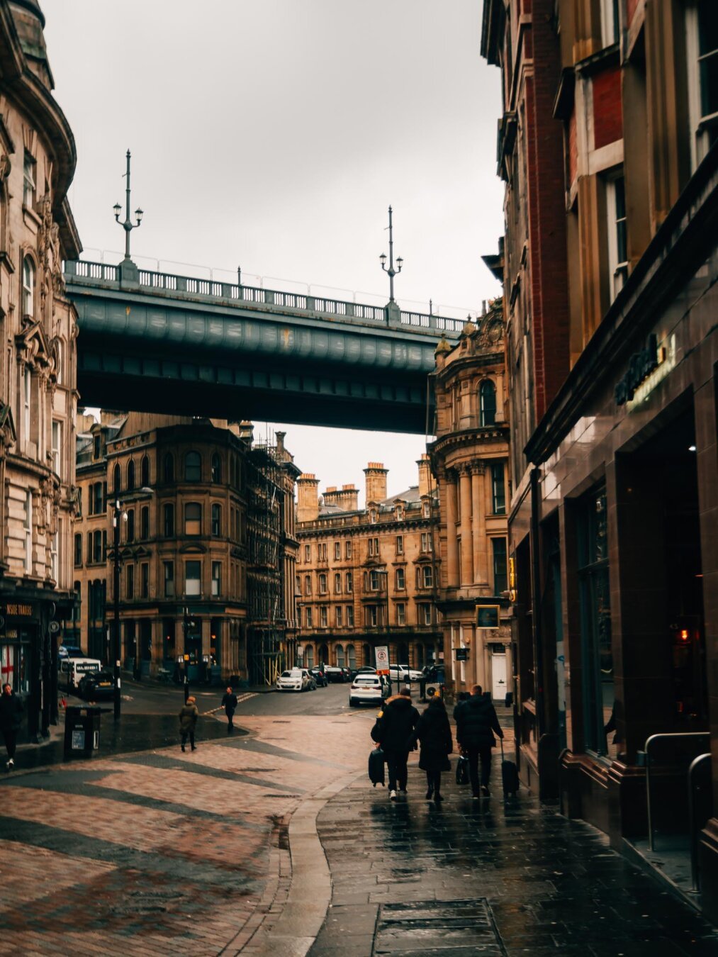 City centre showing pedestrians and a bridge