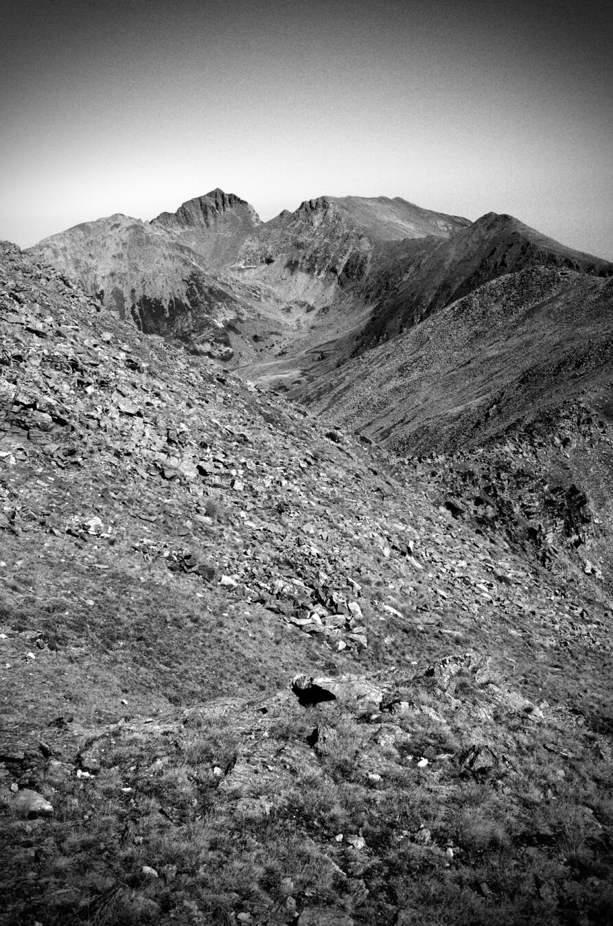 a view of mount canigou from the crest on the other side. all is very mineral, as there are only rocks to see.