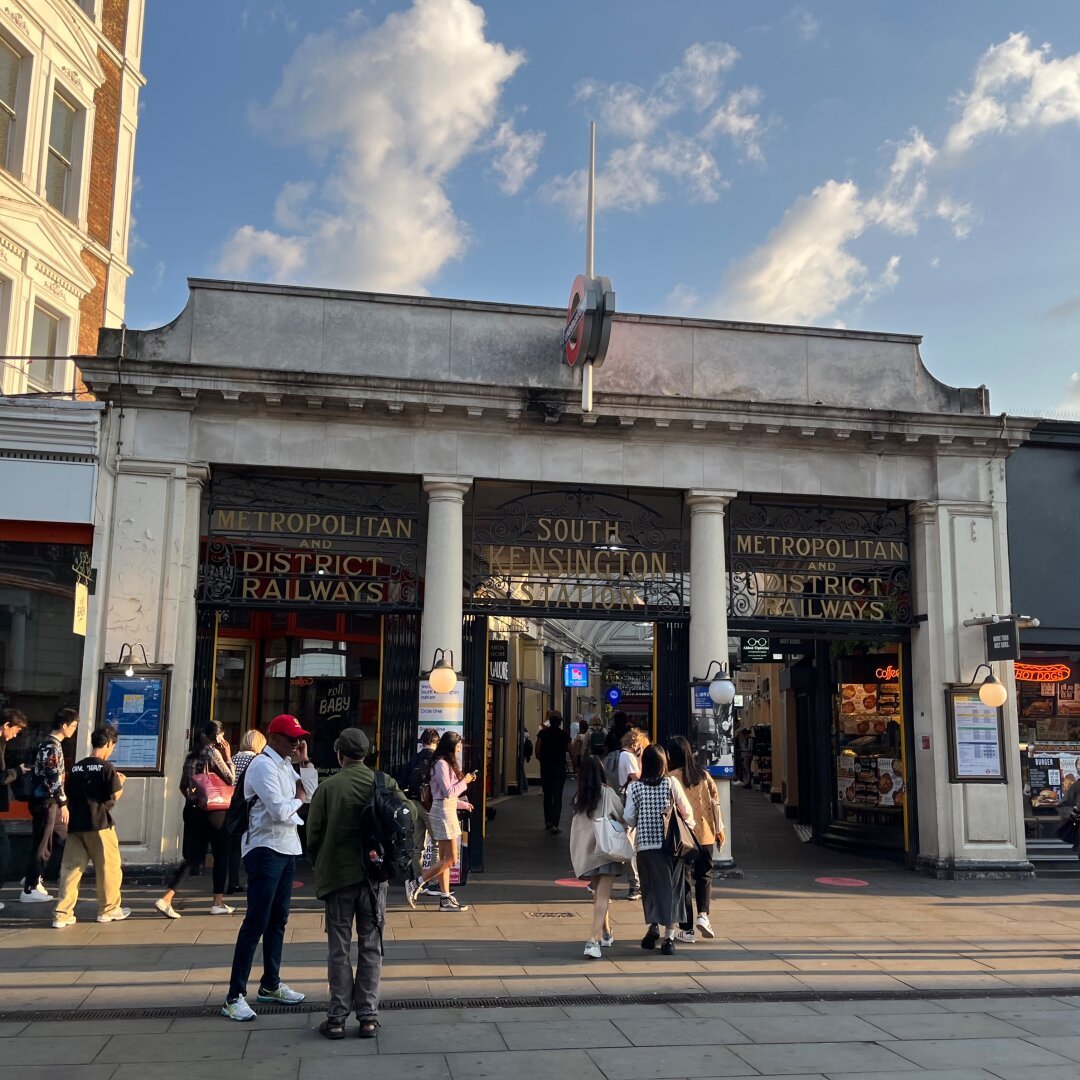 A photo of the entrance to South Kensington Station in London.