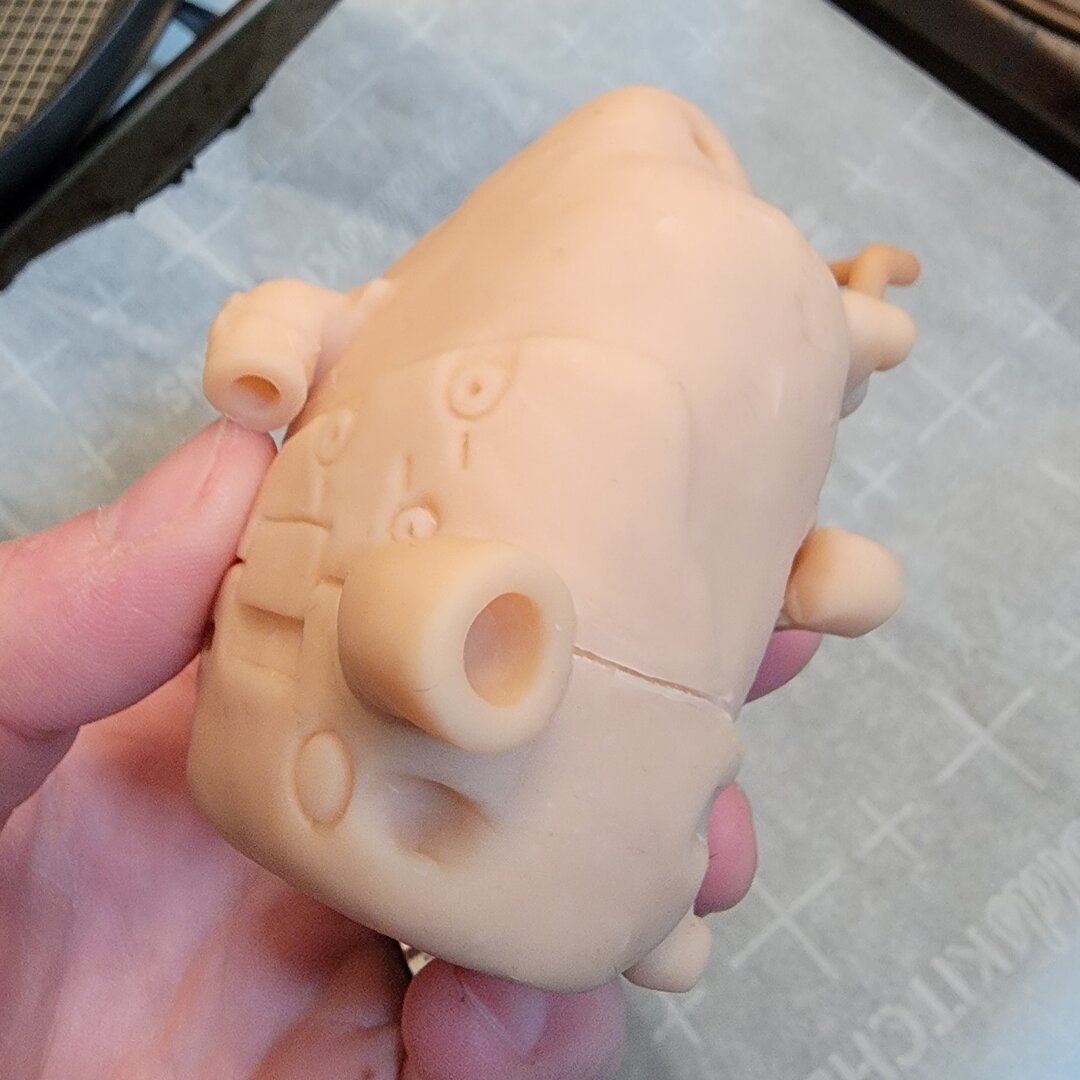 Another angled closeup of the other front edge, showing both valve pipes are actually hollowed out.