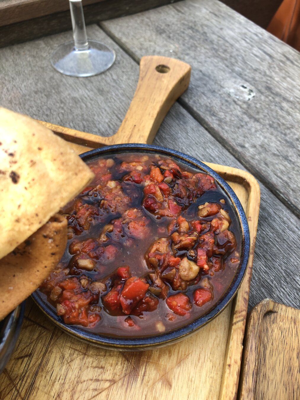 Plate with crackers and muhammara