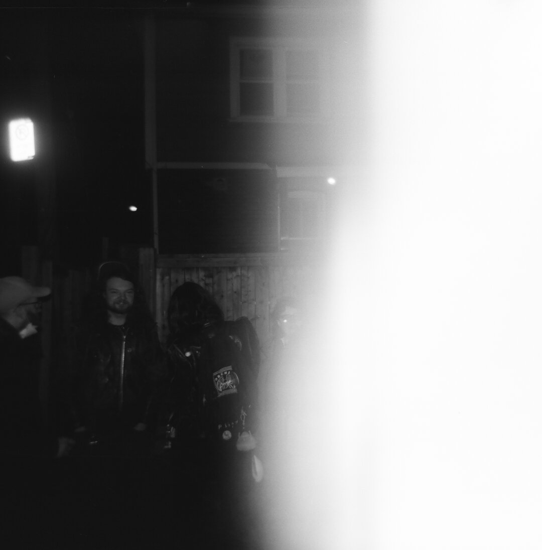 half light leaked frame from behind the arcade. holga 120cfn kentmere 400