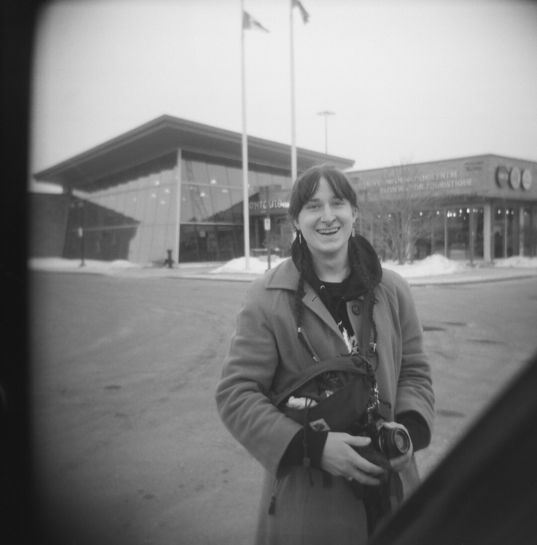 willa, amused by the fact that i had a holga. at an onroute. holga 120cfn kentmere 400