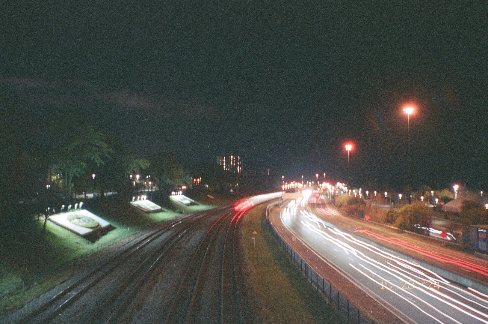 trains are very fast. pentax espio expired kodak gold 400